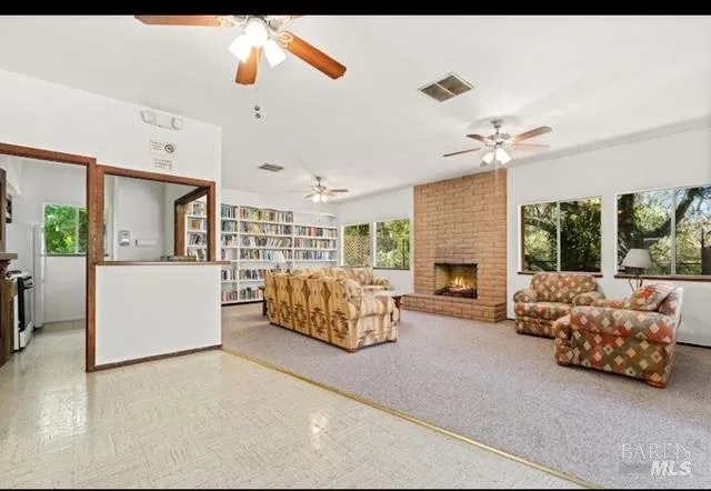 a view of utility room and livingroom