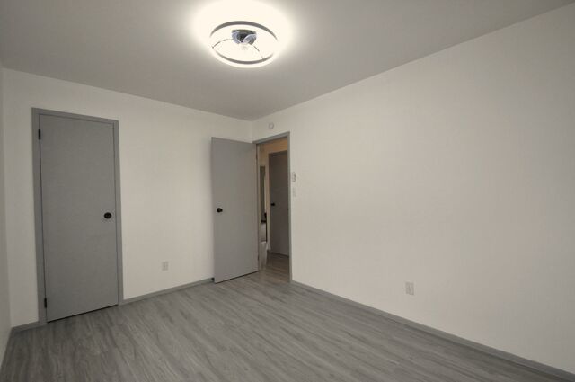 1703 Florence Street Streator, IL 61364 - Photo 16 of 33 a view of an empty room with wooden floor