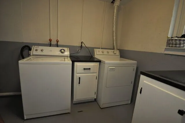 a view of cabinets with wooden floor