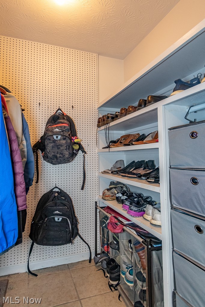 321 Barrington Ridge Road Painesville, OH 44077 - Photo 16 of 34 Just inside the attached garage, this beauty is one of the many amazing storage spaces in this home!