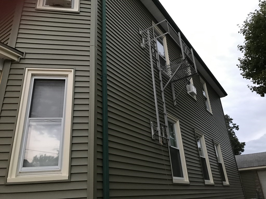 833 Jefferson Street Fall River, MA 02721 - Photo 2 of 5 a view of a building entryway