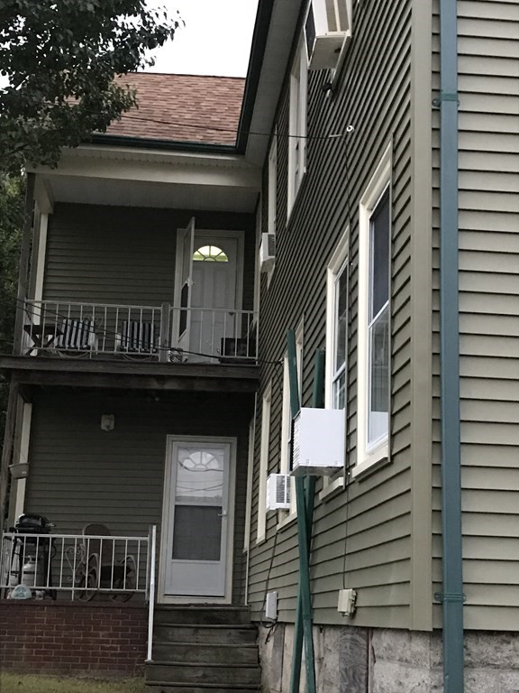 833 Jefferson Street Fall River, MA 02721 - Photo 4 of 5 a view of a house with a door