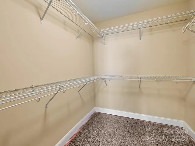 a view of a room with racks on the wall