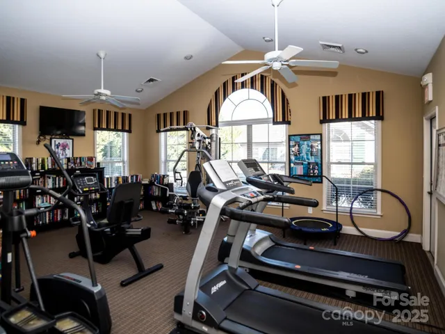 a room with lots of gym equipment