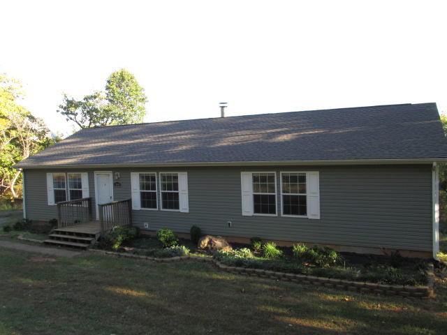 2542 Porters Mountain Road Blue Ridge, VA 24064 - Photo 1 of 31 a front view of house with yard
