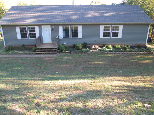 2542 Porters Mountain Road Blue Ridge, VA 24064 - Photo 2 of 31 a front view of a house with a yard