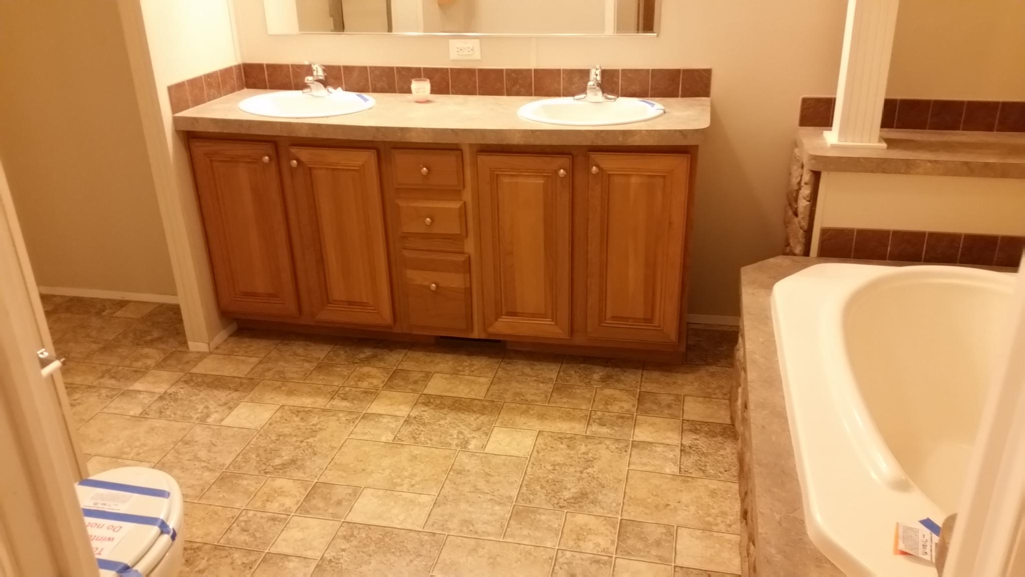 2542 Porters Mountain Road Blue Ridge, VA 24064 - Photo 12 of 31 a bathroom with a sink and a mirror