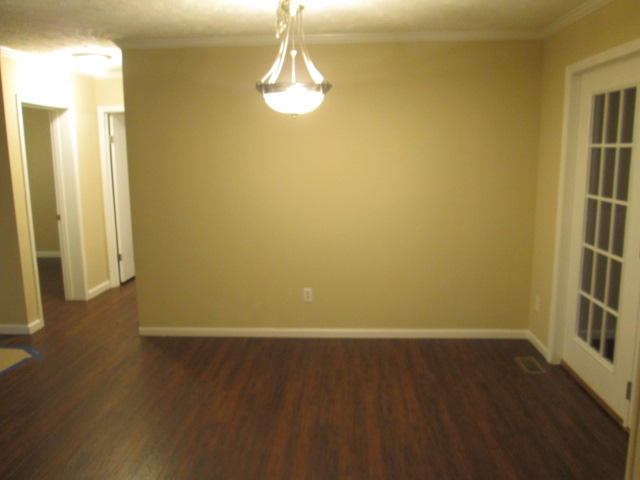 2542 Porters Mountain Road Blue Ridge, VA 24064 - Photo 22 of 31 a view of a room with wooden floor and a window