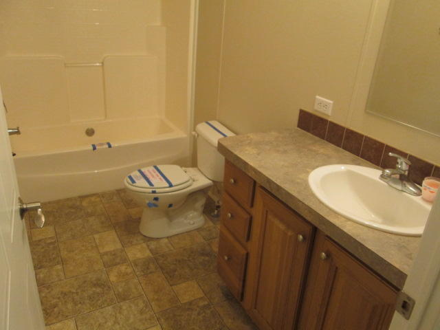 2542 Porters Mountain Road Blue Ridge, VA 24064 - Photo 25 of 31 a bathroom with a sink and mirror