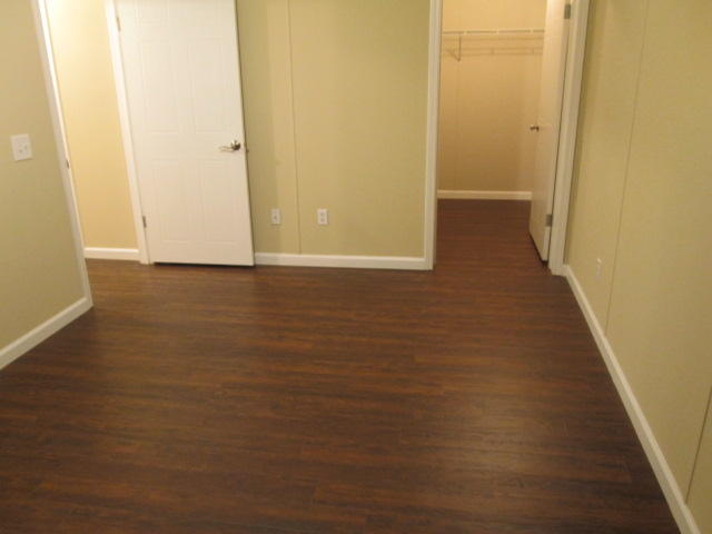 2542 Porters Mountain Road Blue Ridge, VA 24064 - Photo 27 of 31 an empty room with wooden floor