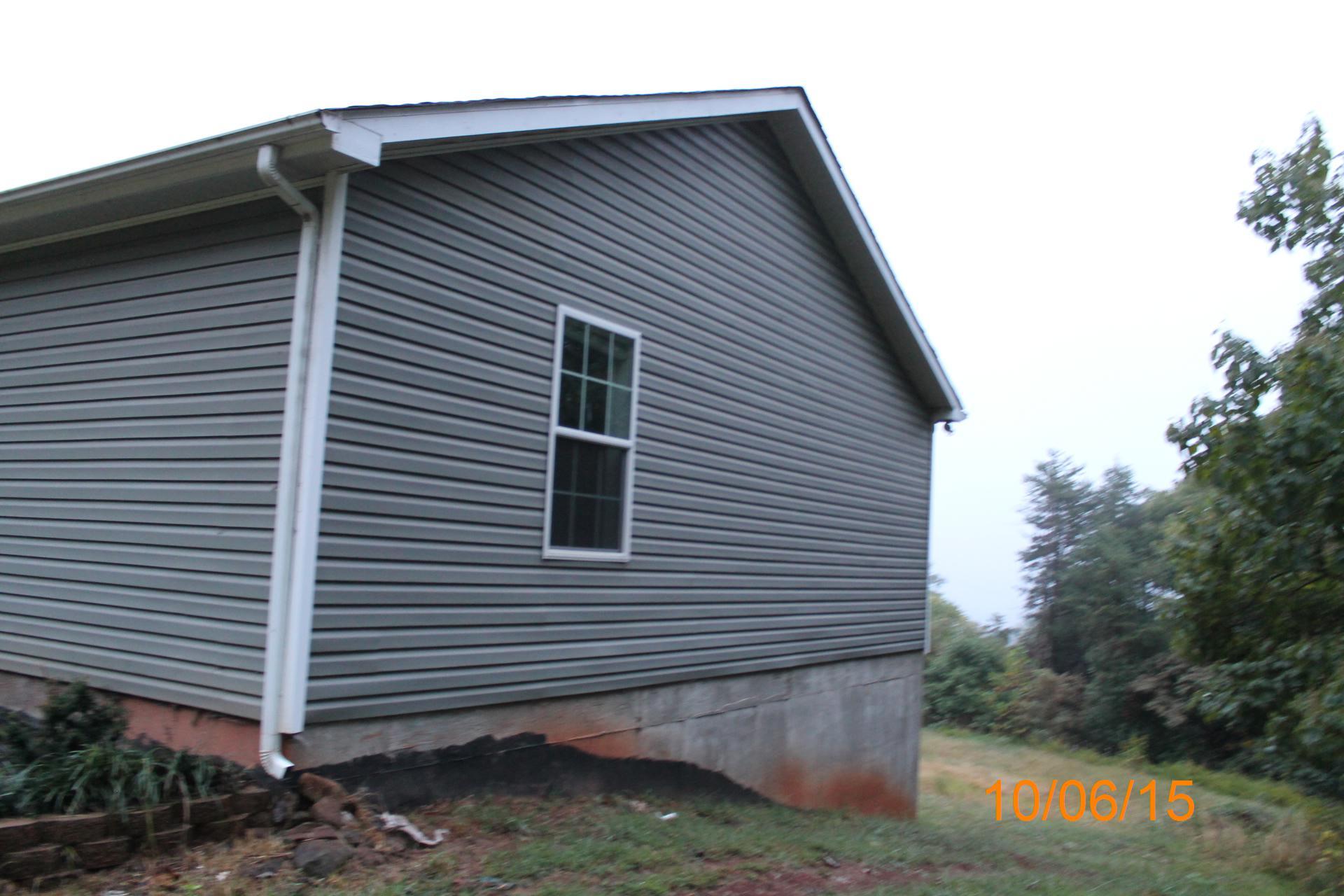 2542 Porters Mountain Road Blue Ridge, VA 24064 - Photo 5 of 31 a view of a house with a yard
