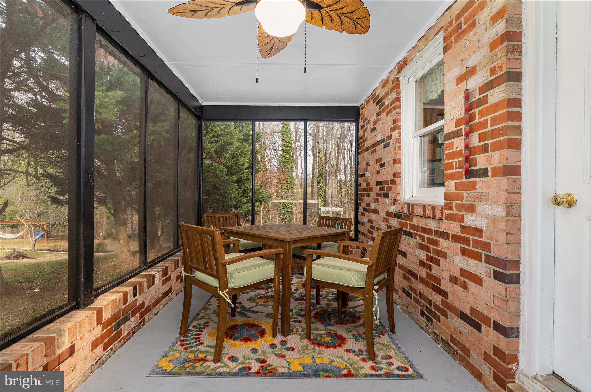 19 Well Street Huntingtown, MD 20639 - Photo 13 of 44 a dining room with furniture and a floor to ceiling window