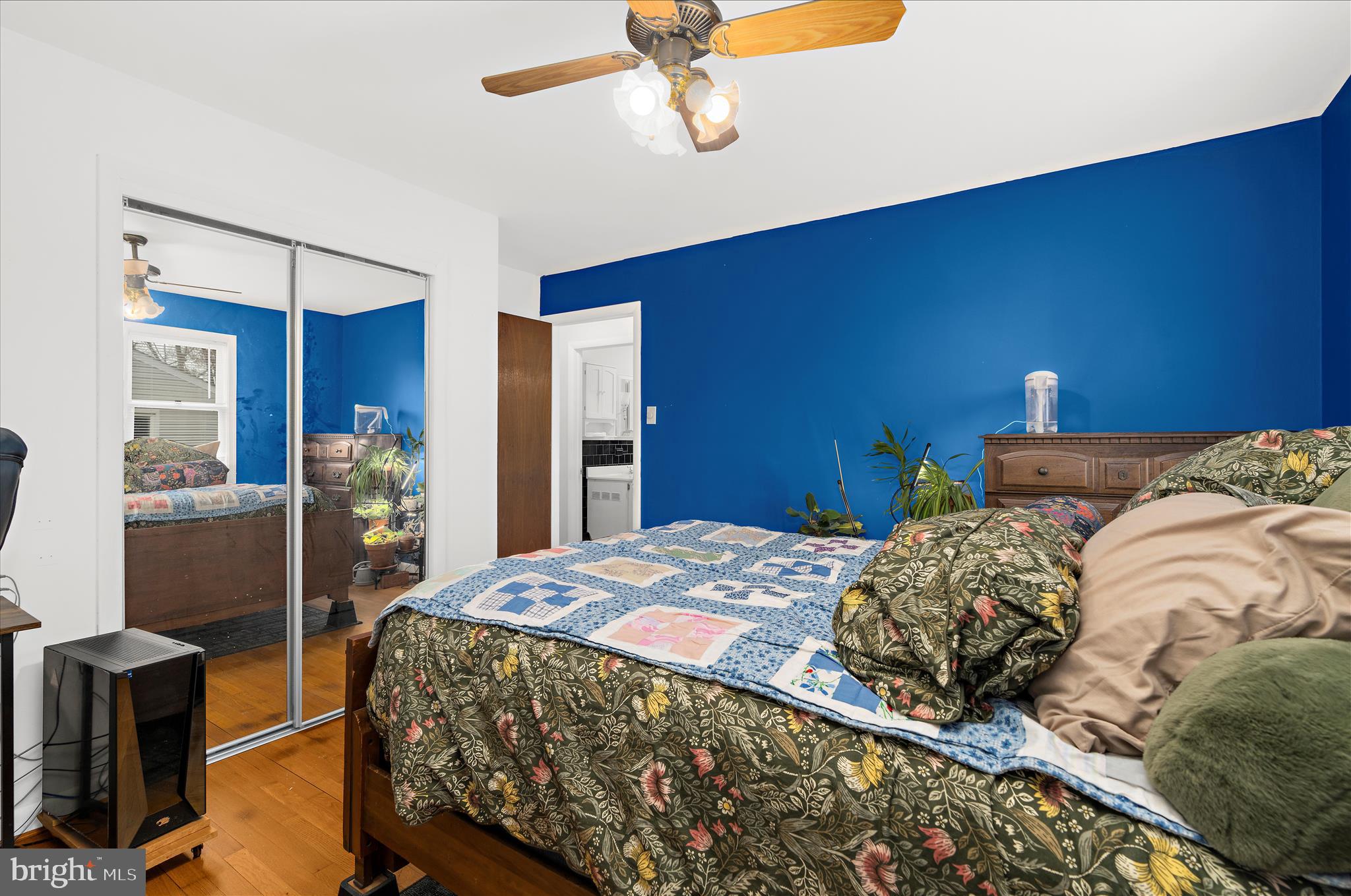 19 Well Street Huntingtown, MD 20639 - Photo 20 of 44 a bedroom with a bed and wooden floor