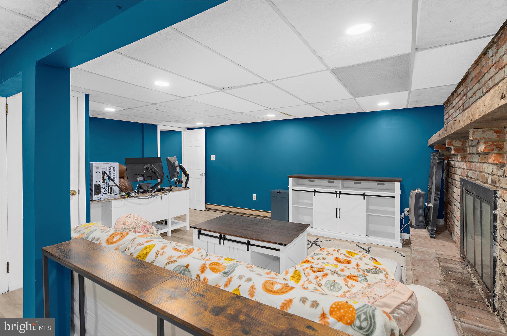 19 Well Street Huntingtown, MD 20639 - Photo 32 of 44 a room with furniture and a flat screen tv