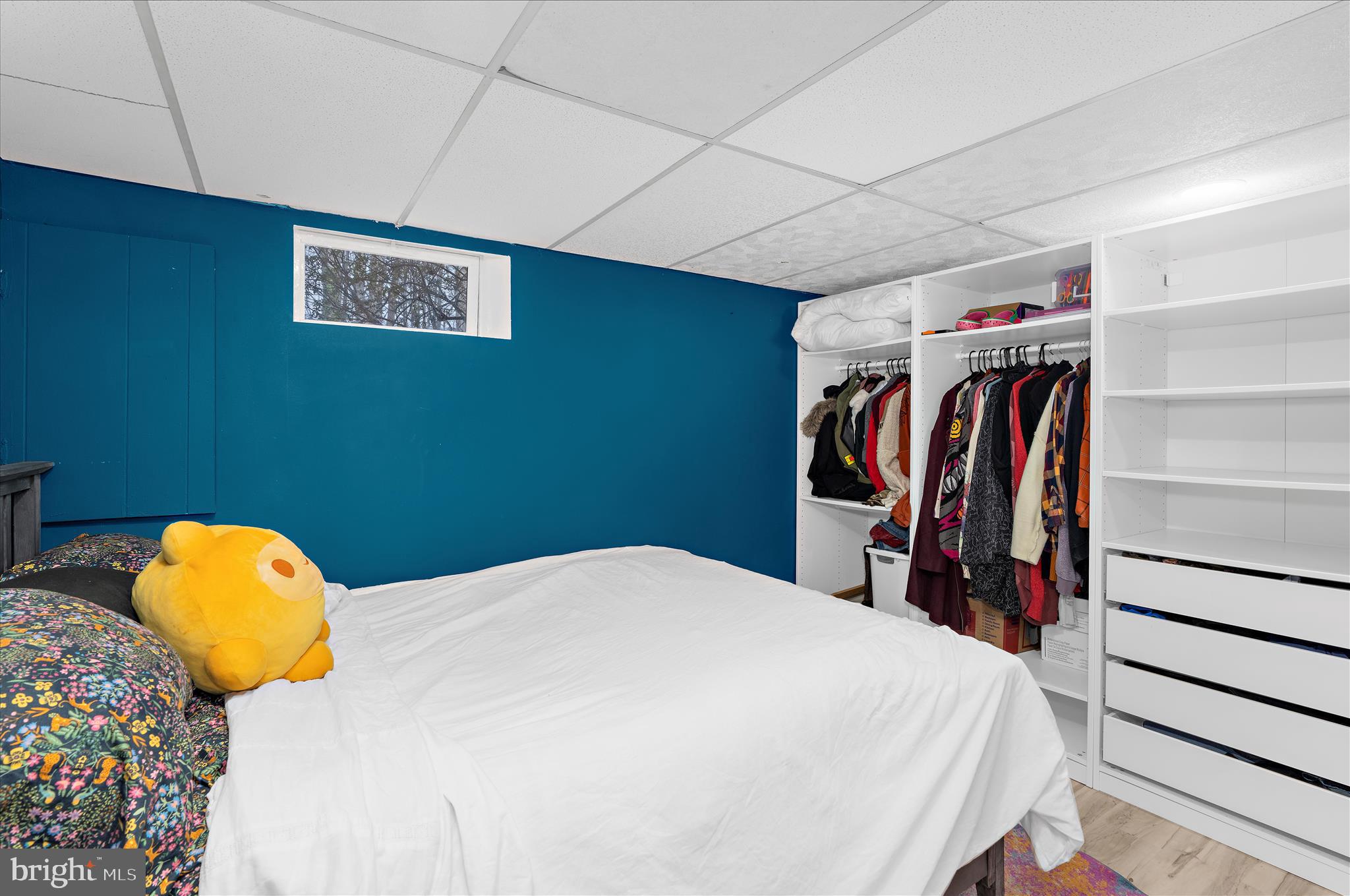 19 Well Street Huntingtown, MD 20639 - Photo 35 of 44 a view of walk in closet with clothes and shoes