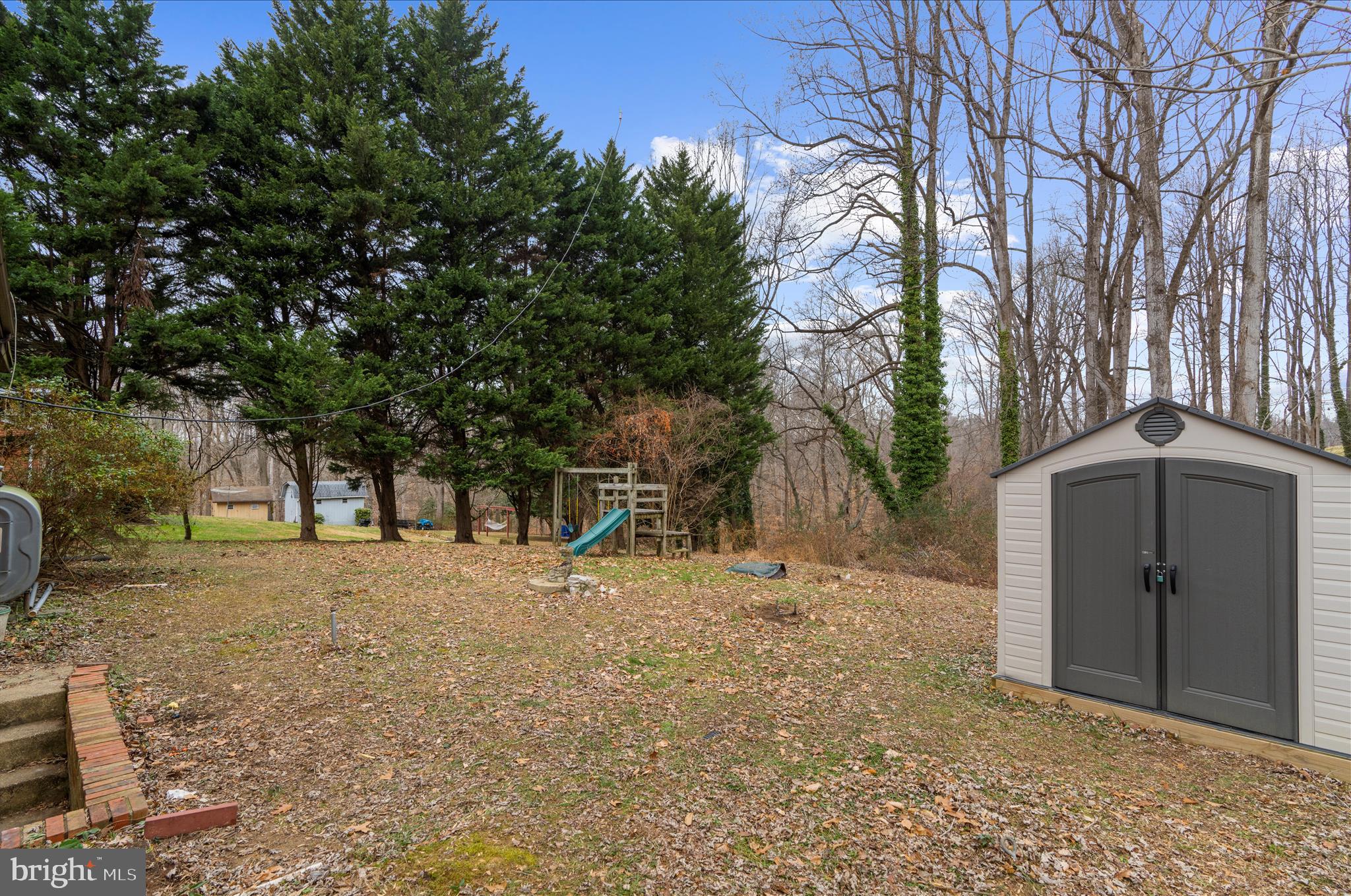 19 Well Street Huntingtown, MD 20639 - Photo 38 of 44 a backyard of a house with lots of green space