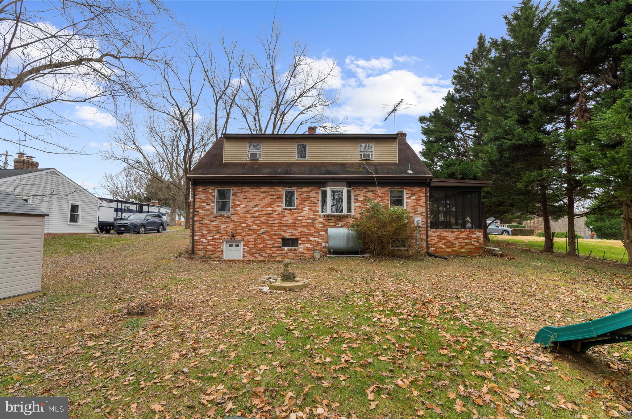 19 Well Street Huntingtown, MD 20639 - Photo 40 of 44 a view of a house with a yard covered in snow