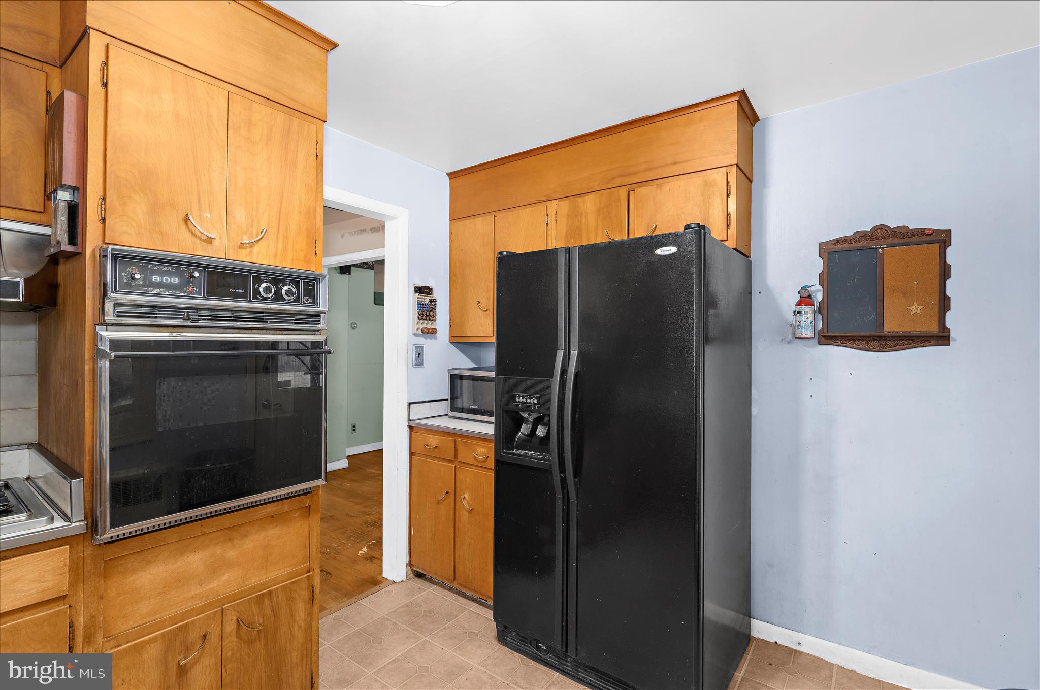 19 Well Street Huntingtown, MD 20639 - Photo 9 of 44 a view of a refrigerator in kitchen and a sink