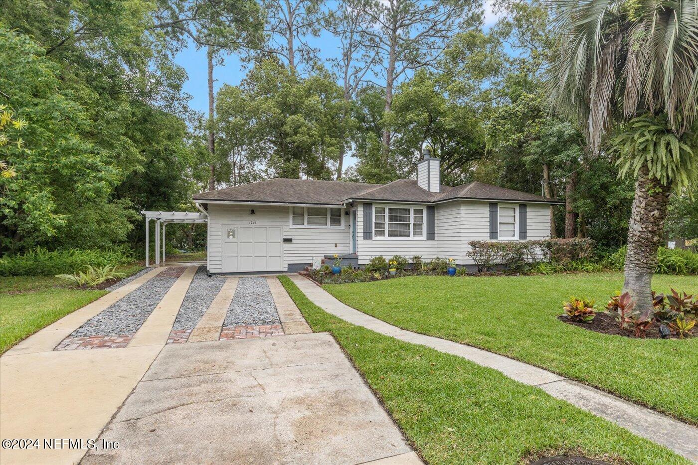 1273 Lechlade Circle Jacksonville, FL 32205 - Photo 2 of 33 a view of a house with a yard