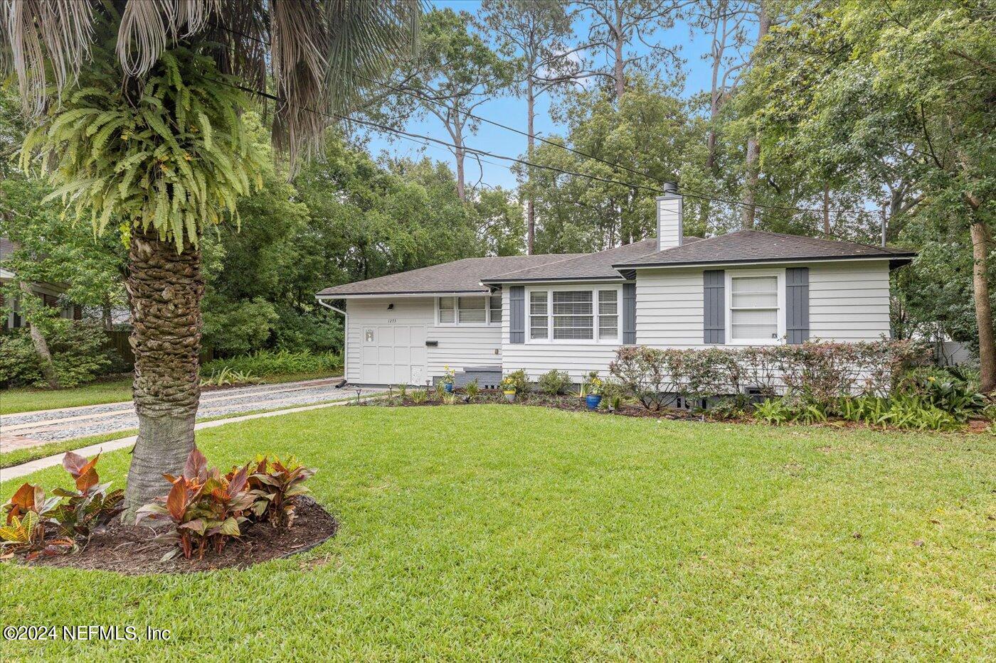 1273 Lechlade Circle Jacksonville, FL 32205 - Photo 4 of 33 a front view of house with yard and outdoor seating