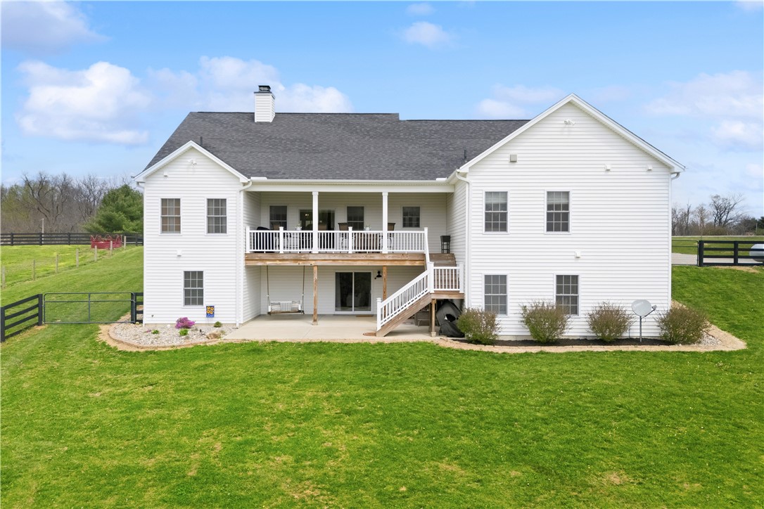 1158 Pyle Road Clarksville, OH 45113 - Photo 10 of 76 This classic white home offers a welcoming facade with a spacious backyard, perfect for outdoor living.