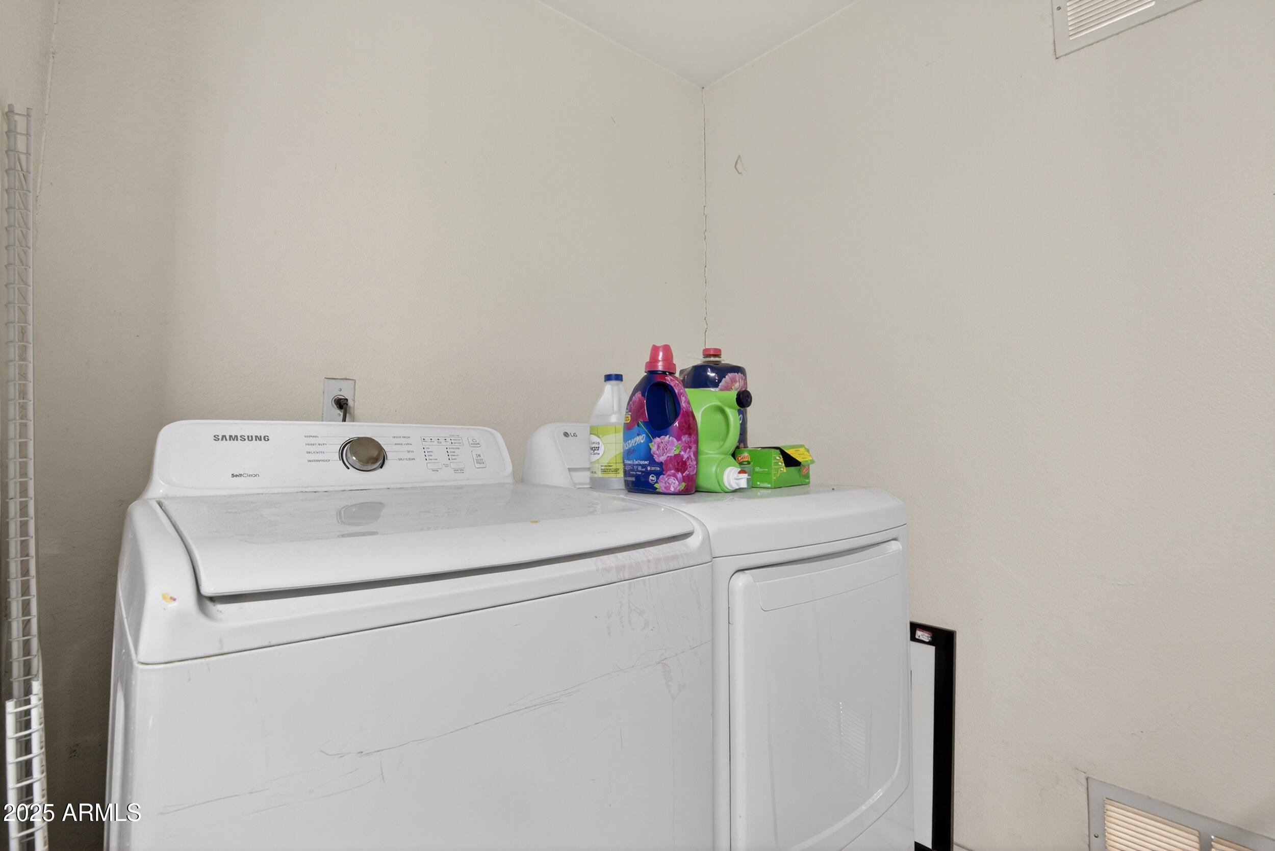 8429 West Coronado Road Phoenix, AZ 85037 - Photo 29 of 37 a utility room with dryer and washer