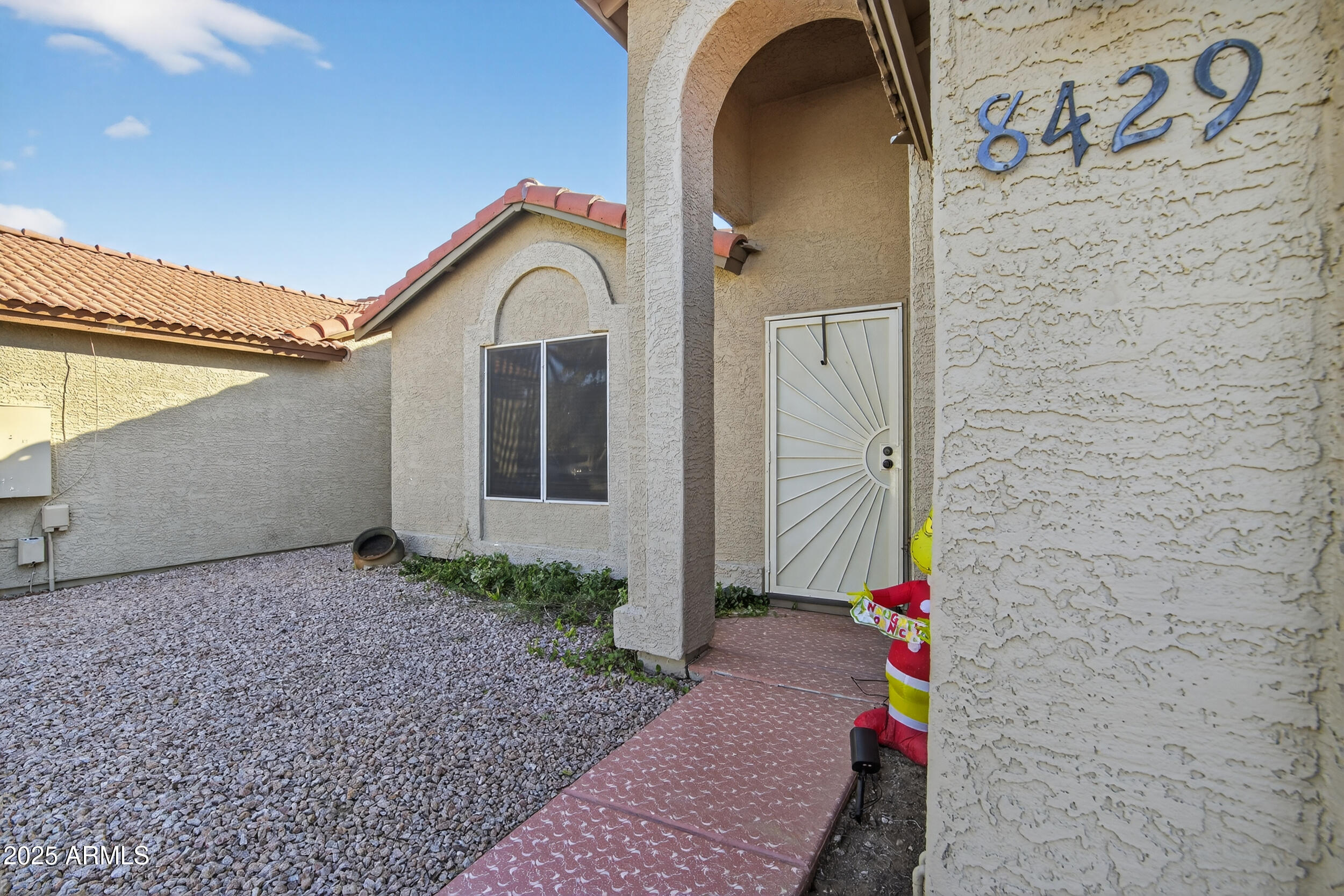 8429 West Coronado Road Phoenix, AZ 85037 - Photo 5 of 37 a view of front door