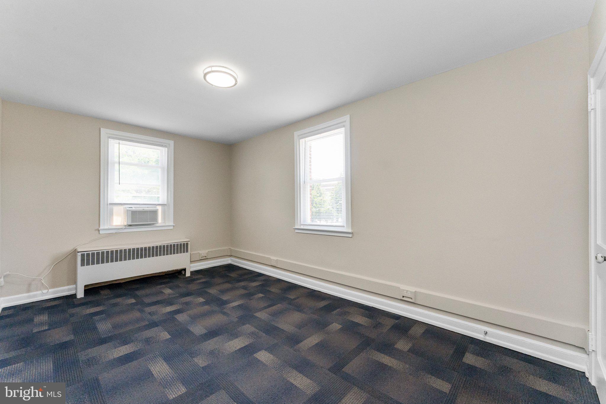 5346 Chew Avenue, Unit 2B Philadelphia, PA 19138 - Photo 17 of 18 an empty room with a window