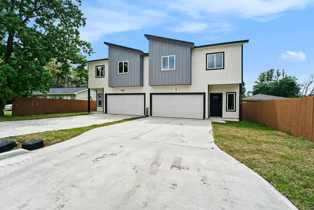 a house view with a backyard space