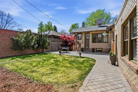 a view of a house with fountain bath tub and chair