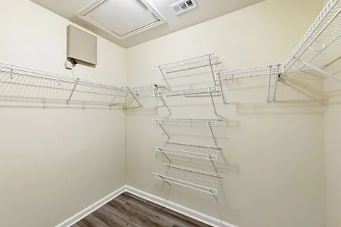 a view of a room with racks on the wall