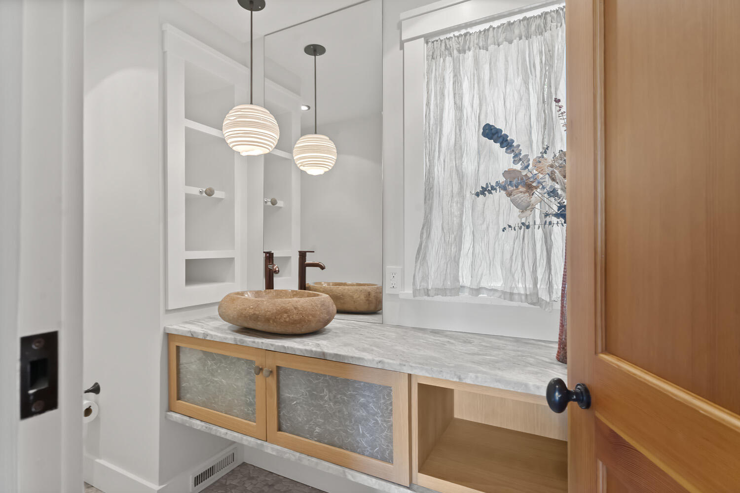 308 S Road Chilmark, MA 02535 - Photo 23 of 41 a bathroom with a sink and a mirror