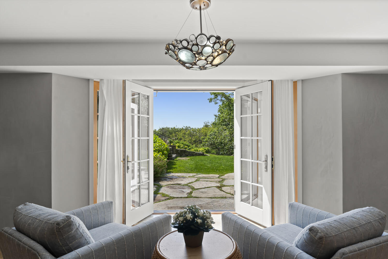 308 S Road Chilmark, MA 02535 - Photo 32 of 41 a living room with furniture and a floor to ceiling window
