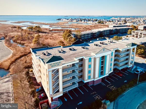 a view of a balcony with an ocean view