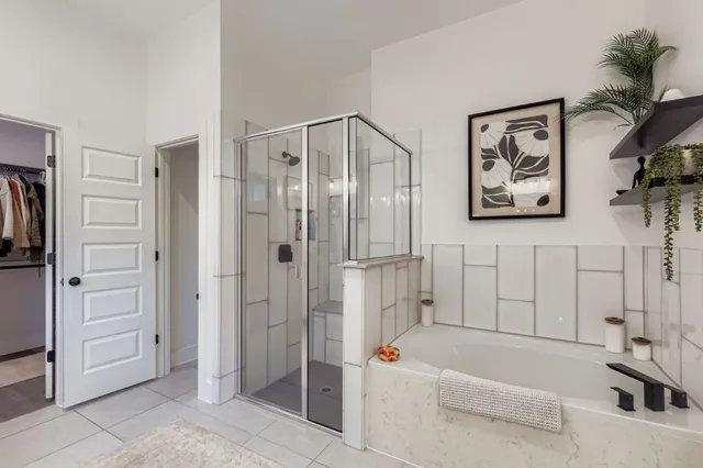 a bathroom with a double vanity sink and mirror