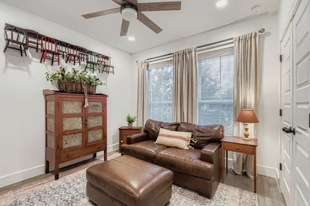 a living room with furniture and a gate