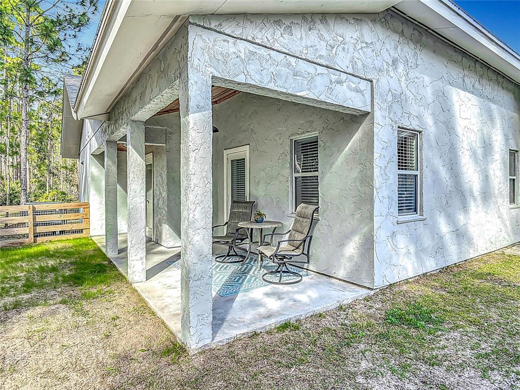 4252 Quail Ranch Road New Smyrna Beach, FL 32168 - Photo 51 of 77 side patio