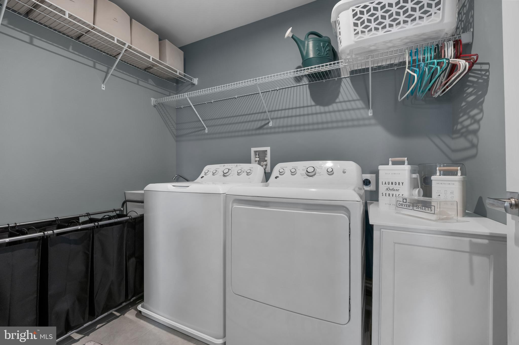 66 Senators Way Berlin, NJ 08009 - Photo 18 of 33 a utility room with dryer and washer