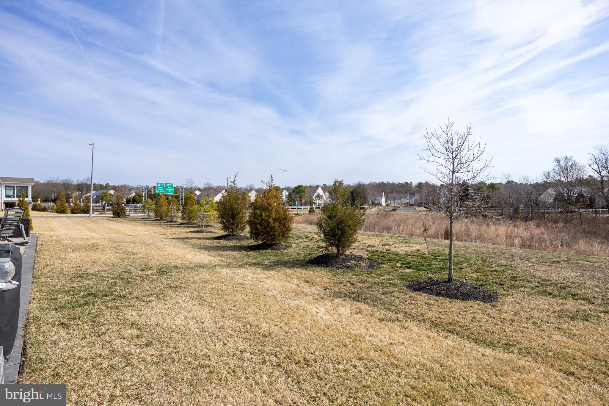 66 Senators Way Berlin, NJ 08009 - Photo 28 of 33 a view of a road with a building in the background