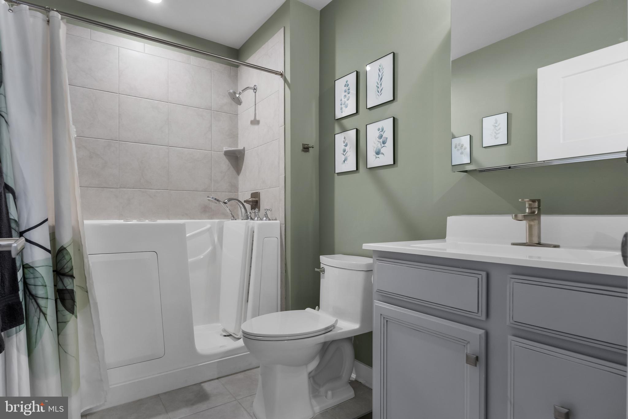 66 Senators Way Berlin, NJ 08009 - Photo 6 of 33 a bathroom with a sink a toilet and shower