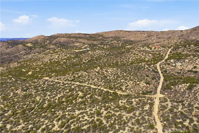 a view of a yard with an outdoor space