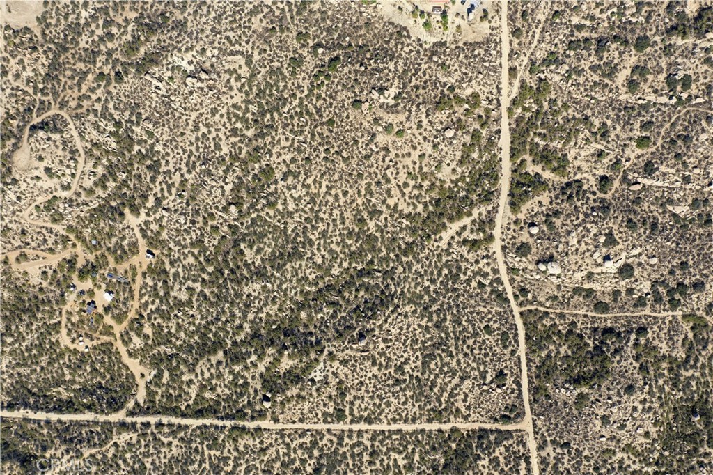 0 Indian Peak Road Aguanga, CA 92536 - Photo 13 of 26 a bathroom with a shower curtain