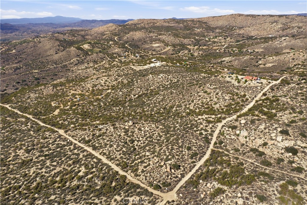 0 Indian Peak Road Aguanga, CA 92536 - Photo 23 of 26 an aerial view of house with yard and mountain view in back