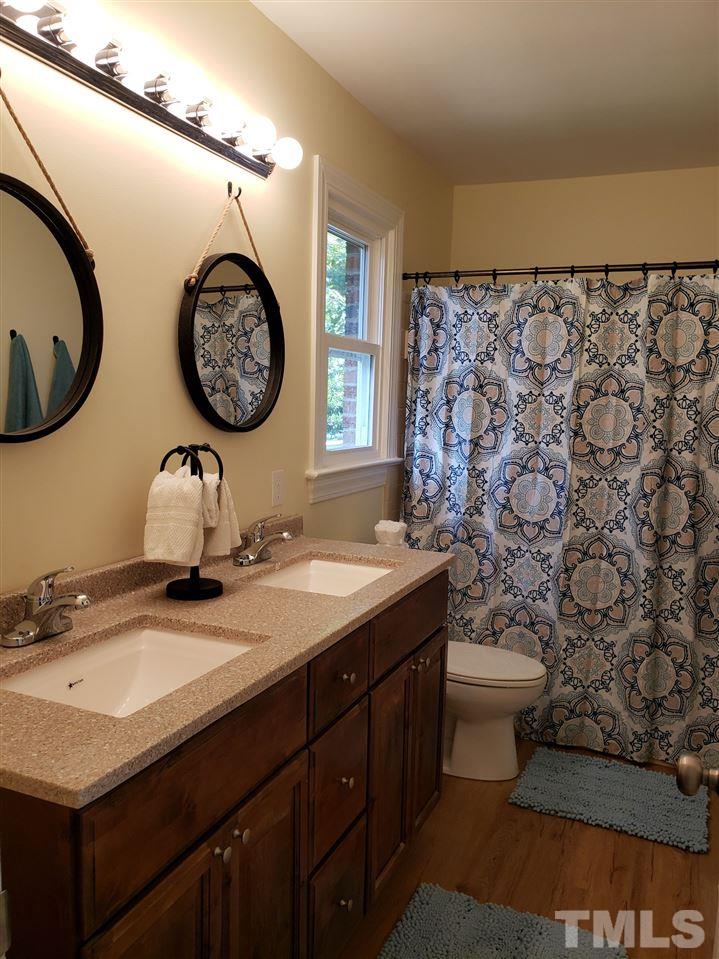 2620 Hiking Trail Raleigh, NC 27615 - Photo 11 of 28 NEW dual vanity cabinet and mirrors.