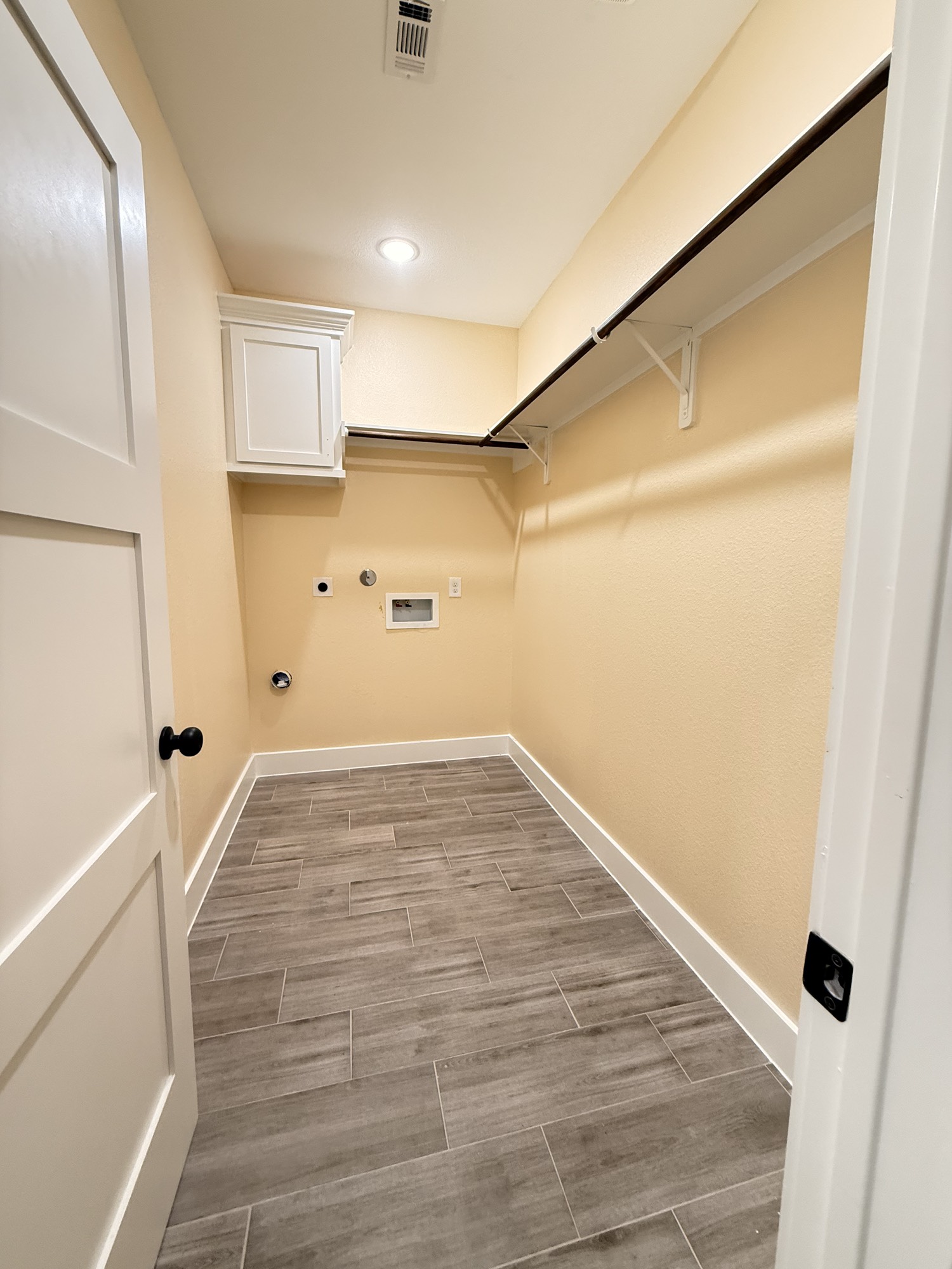 14844 Coaltown Road Willis, TX 77378 - Photo 12 of 30 a view of a room with wooden floor