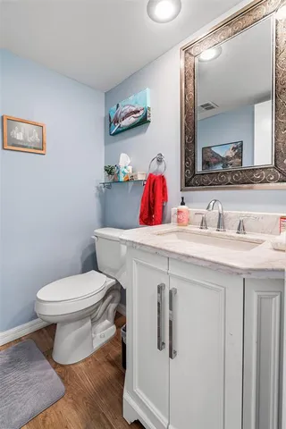 a bathroom with a sink and a toilet