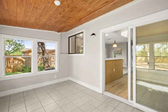 a view of an empty room and window