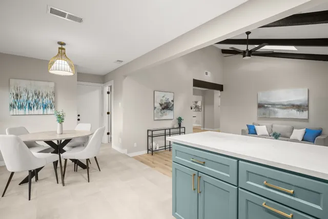 a view of a center island and dining table