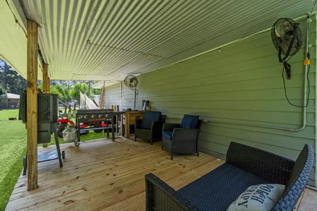 a view of a livingroom with furniture