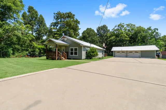 a house with garden in front of it